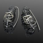 contemporary statement earrings two tone