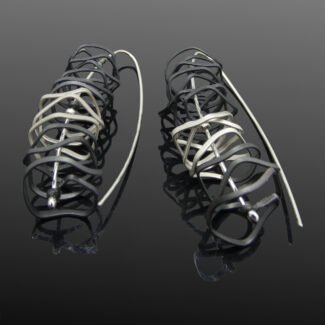 contemporary statement earrings two tone