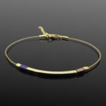 minimalist gold and titanium bracelet