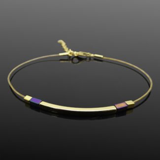 minimalist gold and titanium bracelet