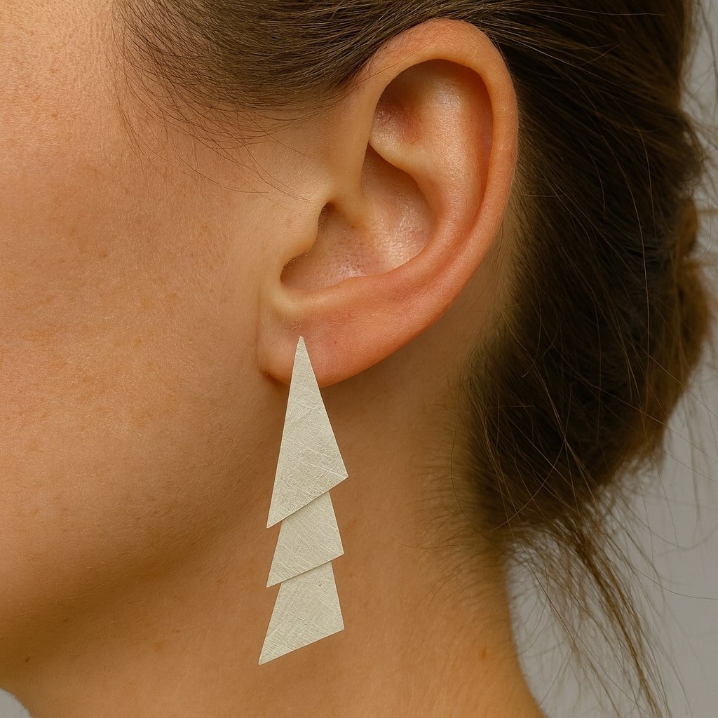 Movable triangle silver earrings