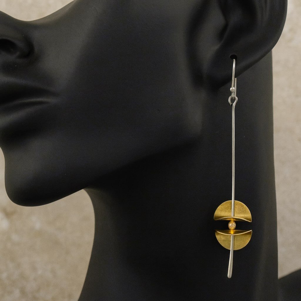 dangly gold and silver handmade earrings