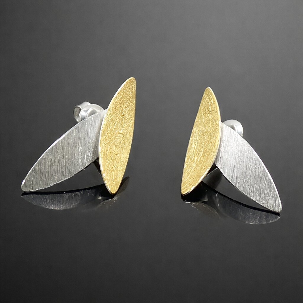 contemporary gold and silver stud earrings