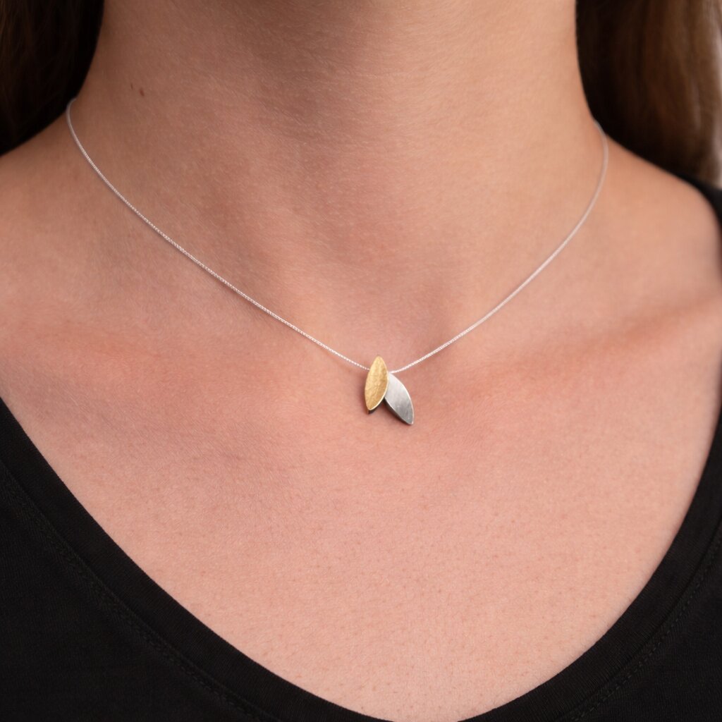 delicate silver and gold necklace
