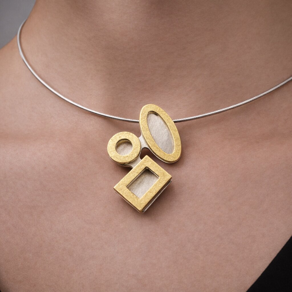 geometric silver and gold necklace