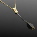 Baltic tie amber necklace with gold plating and two tone oxidised chain