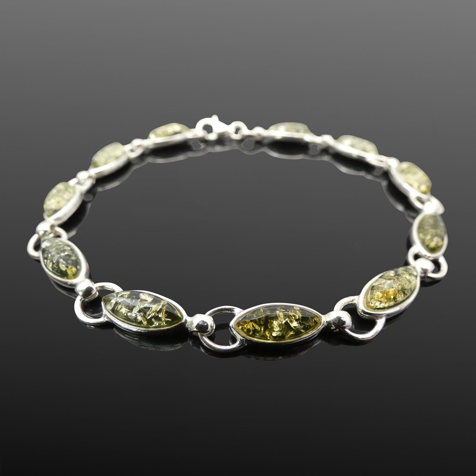 silver green amber bracelet moon jewellery uk Deep green Baltic amber stones set in sterling silver 925 links