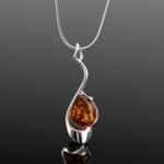 Cognac amber pendant necklace fluid silver frame mirrored finish Gdansk designer