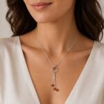 Polish artisan amber tassel necklace worn minimalist everyday style