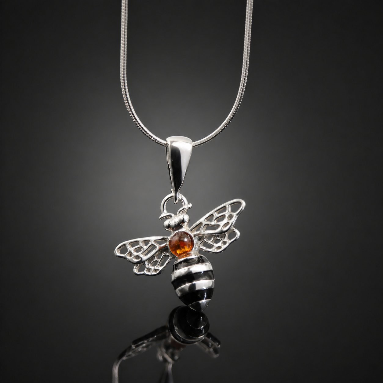Amber pendant necklace bumble bee design mirrored sterling silver Polish artist