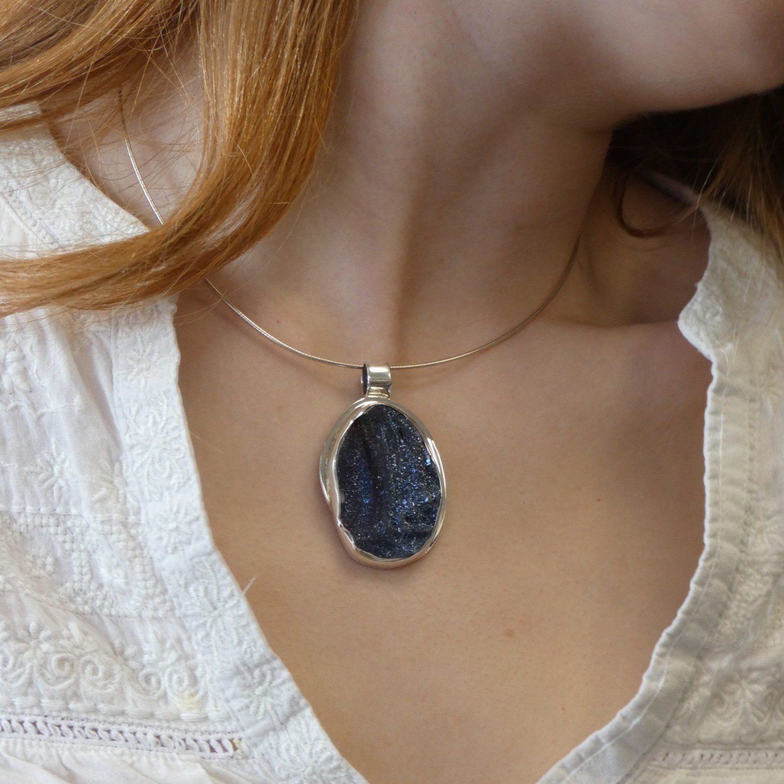 Cobalt blue chalcedony irregular natural stone in sterling silver pendant setting
