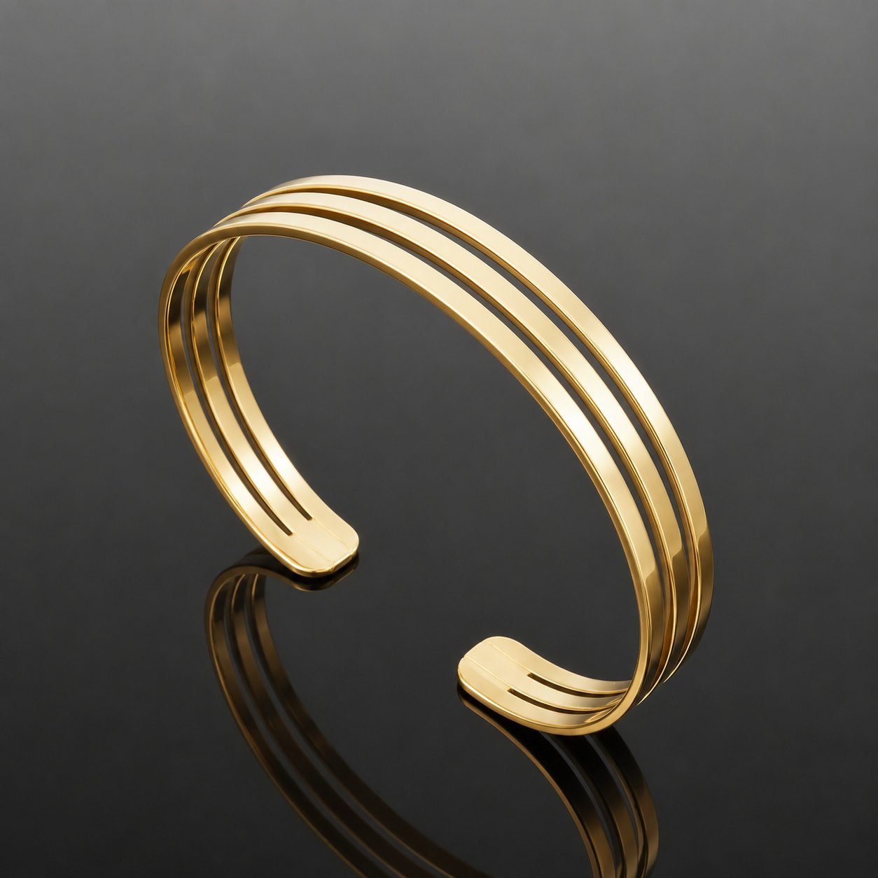 Three fine lines of 14ct gold plated sterling silver 925 triple bangle bracelet close up