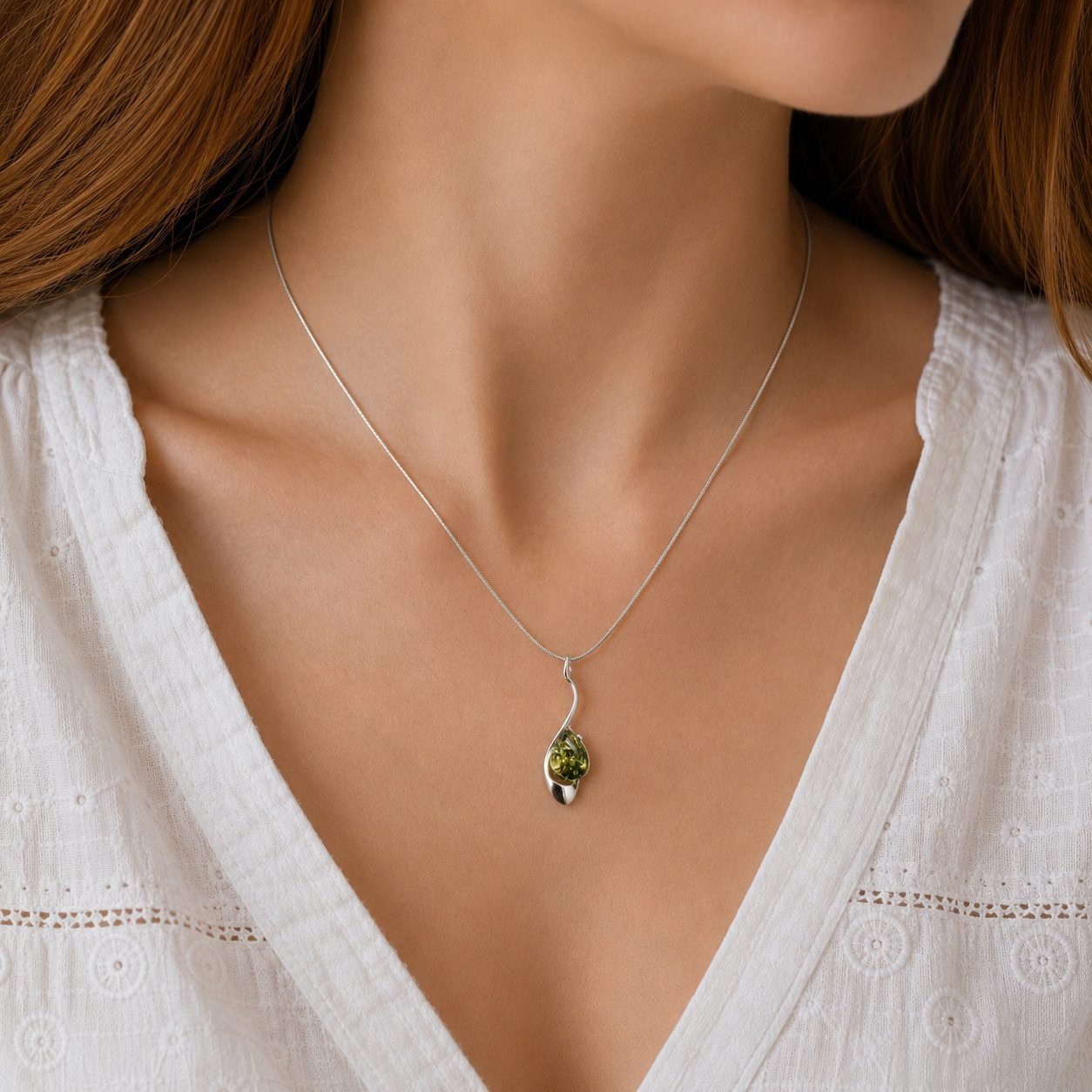 Green amber pendant necklace worn on neckline 42cm chain Gdansk handcrafted