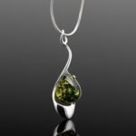Green amber pendant necklace fluid silver frame mirrored finish Gdansk designer