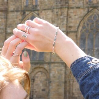 Contemporary green amber ring worn on finger modern Polish design size L