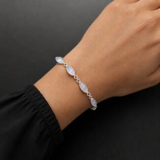 Handmade moonstone bracelet worn on wrist blue shimmer sterling silver 925