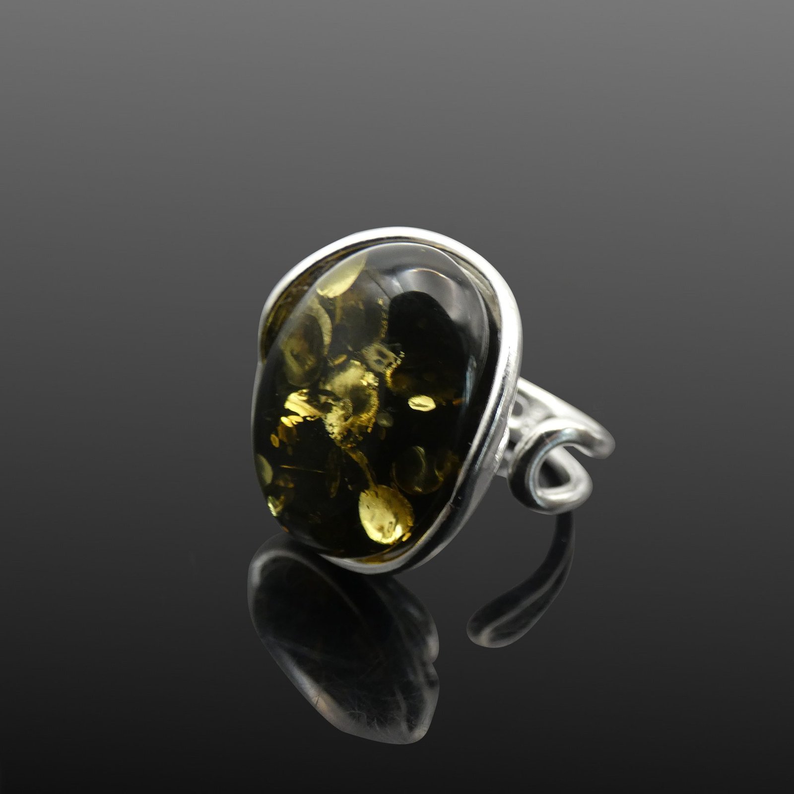 one off green amber ring adjustable silver jewellery durham moon jewellery Green amber ring adjustable sterling silver mirrored finish Polish artisan