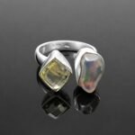 Rough black opal play of fire green blue pink orange red with faceted citrine sterling silver