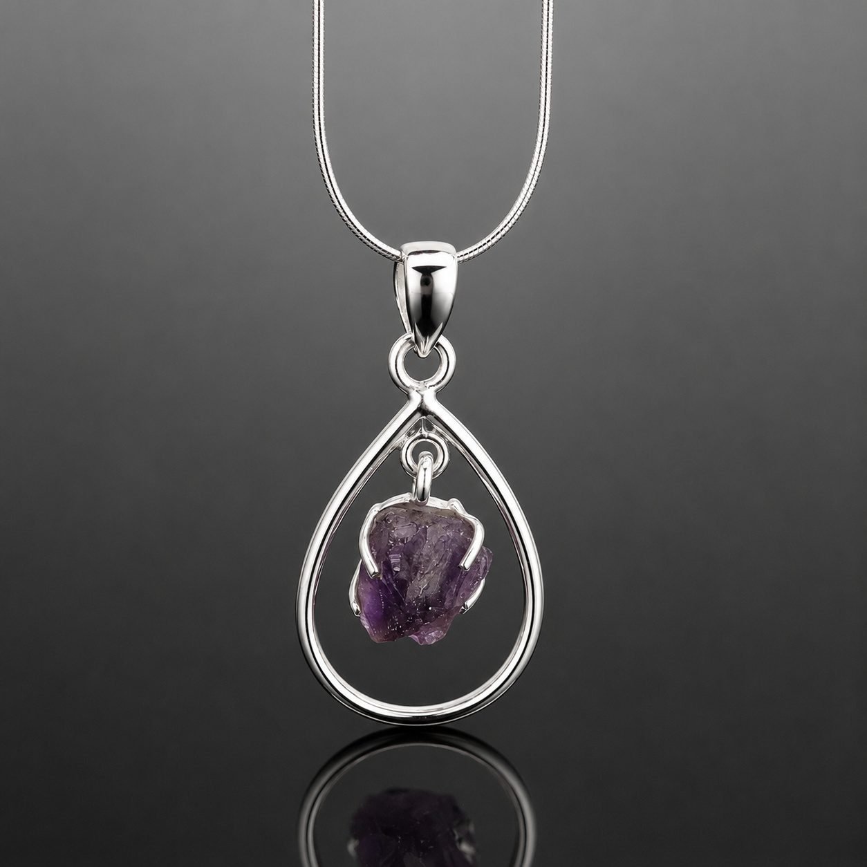 Rough amethyst necklace claw set movable silver frame mirrored finish one of a kind