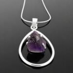 Raw uncut purple amethyst in sterling silver claw setting movable frame 55mm pendant