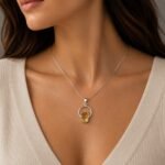 One of a kind rough citrine necklace worn on neckline diamond cut silver chain