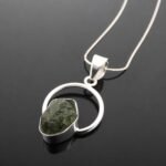 Irregular rough green tourmaline natural crystal in mirrored sterling silver 925 pendant