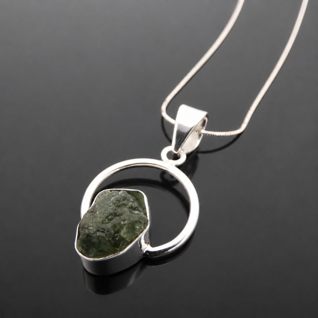 Irregular rough green tourmaline natural crystal in mirrored sterling silver 925 pendant