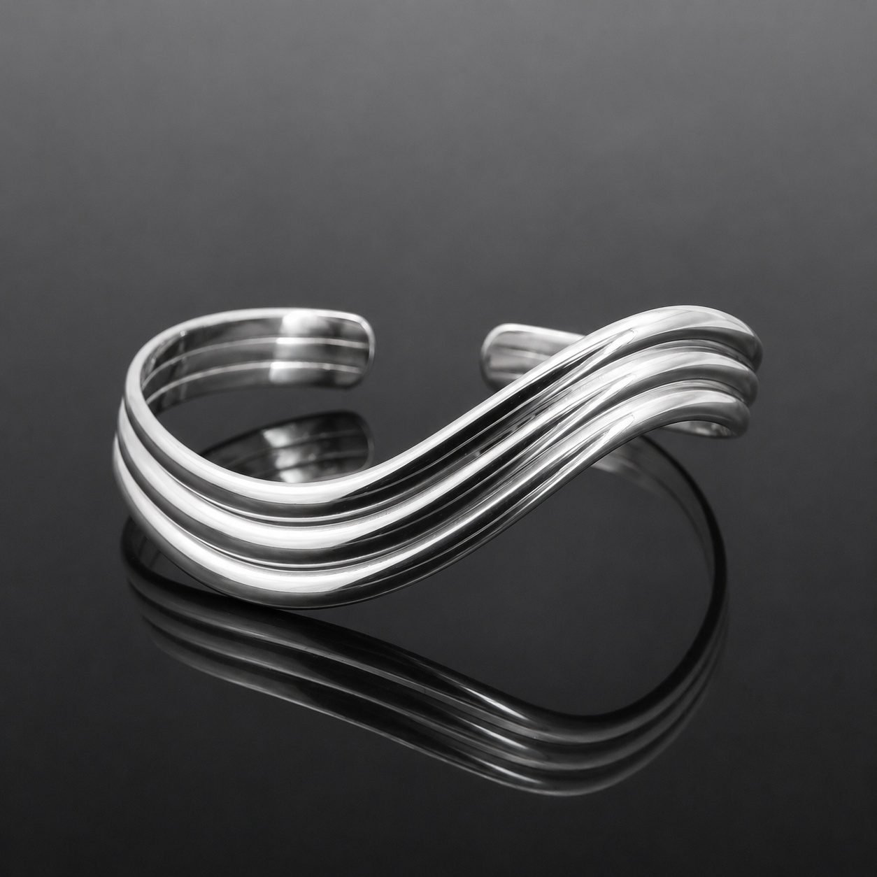 scandinavian silver cuff bangle handmade jewellery uk moon jewellery Silver wave cuff triple line mirrored finish adjustable sterling silver Scandinavian