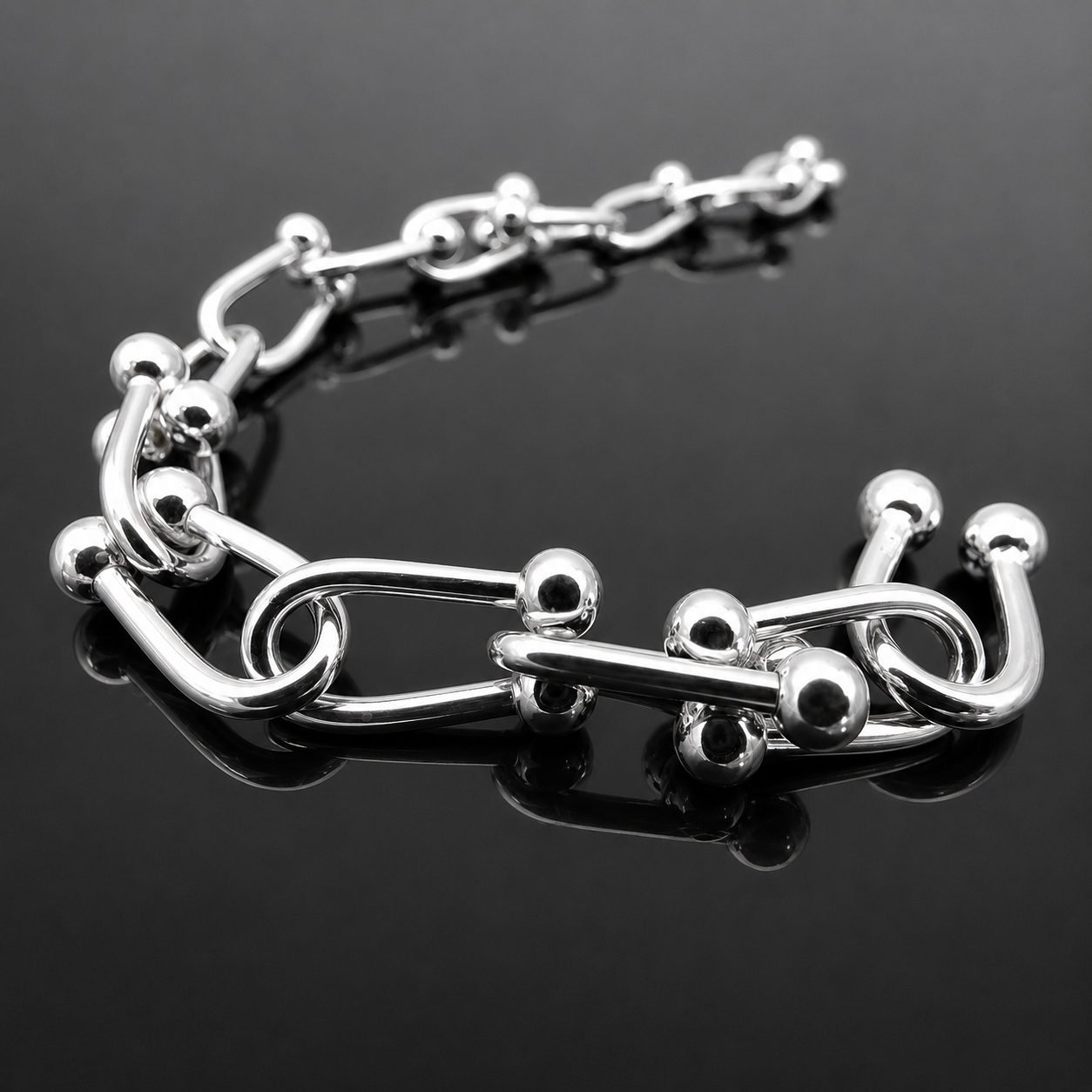 Rounded silver bead peppercorn links mirrored finish sterling silver 925 bracelet close up