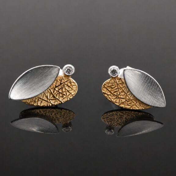 Silver petal stud earrings gold texture satin finish white topaz Polish artist final collection