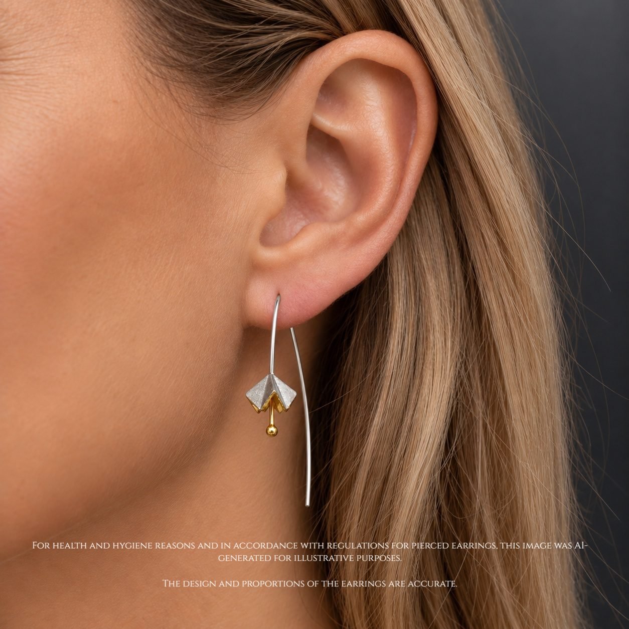 origami black and gold hook earrings contemporary jewellery uk moon jewellery Contemporary origami earrings worn gold front oxidised silver back Japanese flower design