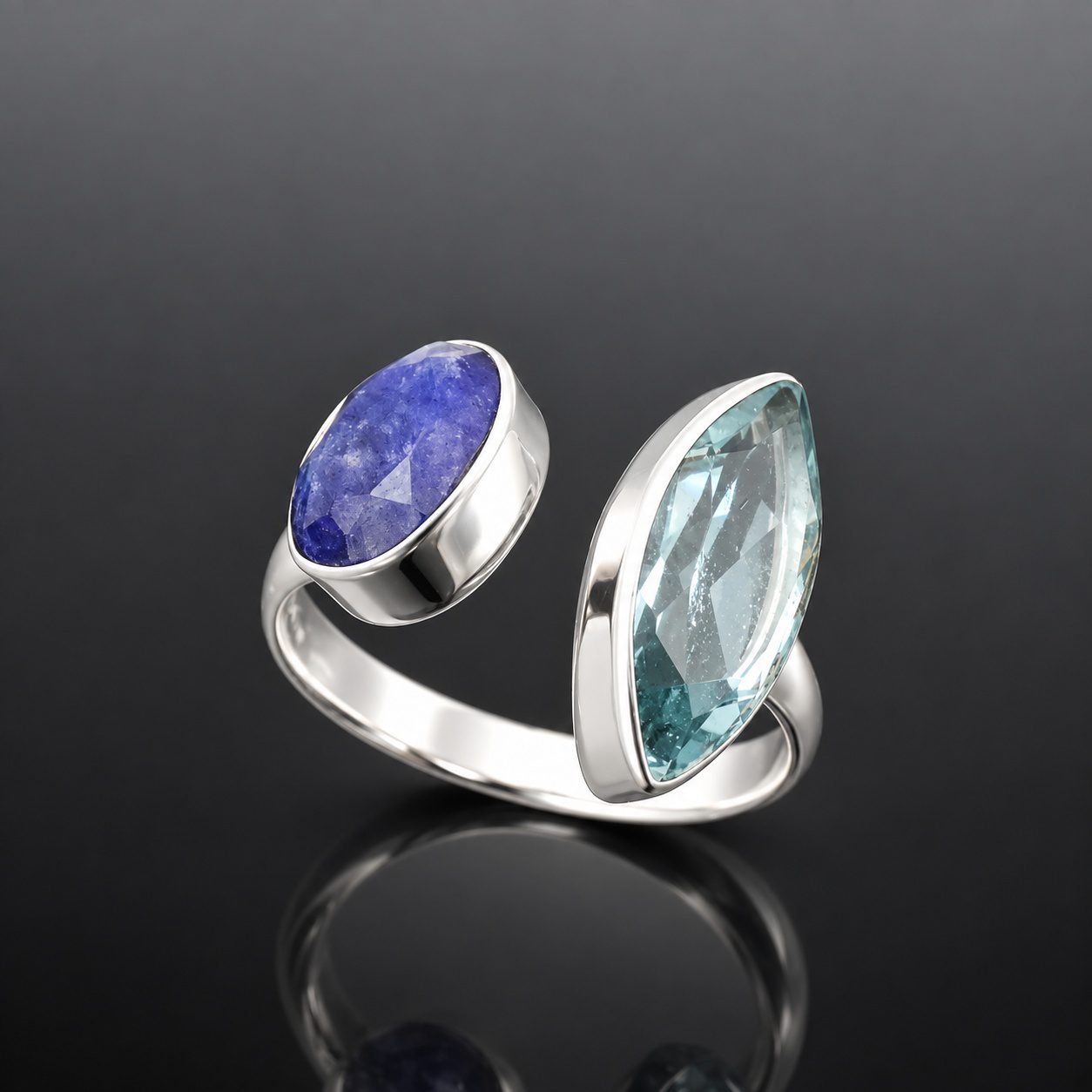 sapphire and topaz adjustable silver ring handmade jewellery uk moon jewellery Sapphire and topaz ring oval deep blue sapphire marquise sky blue topaz mirrored silver adjustable