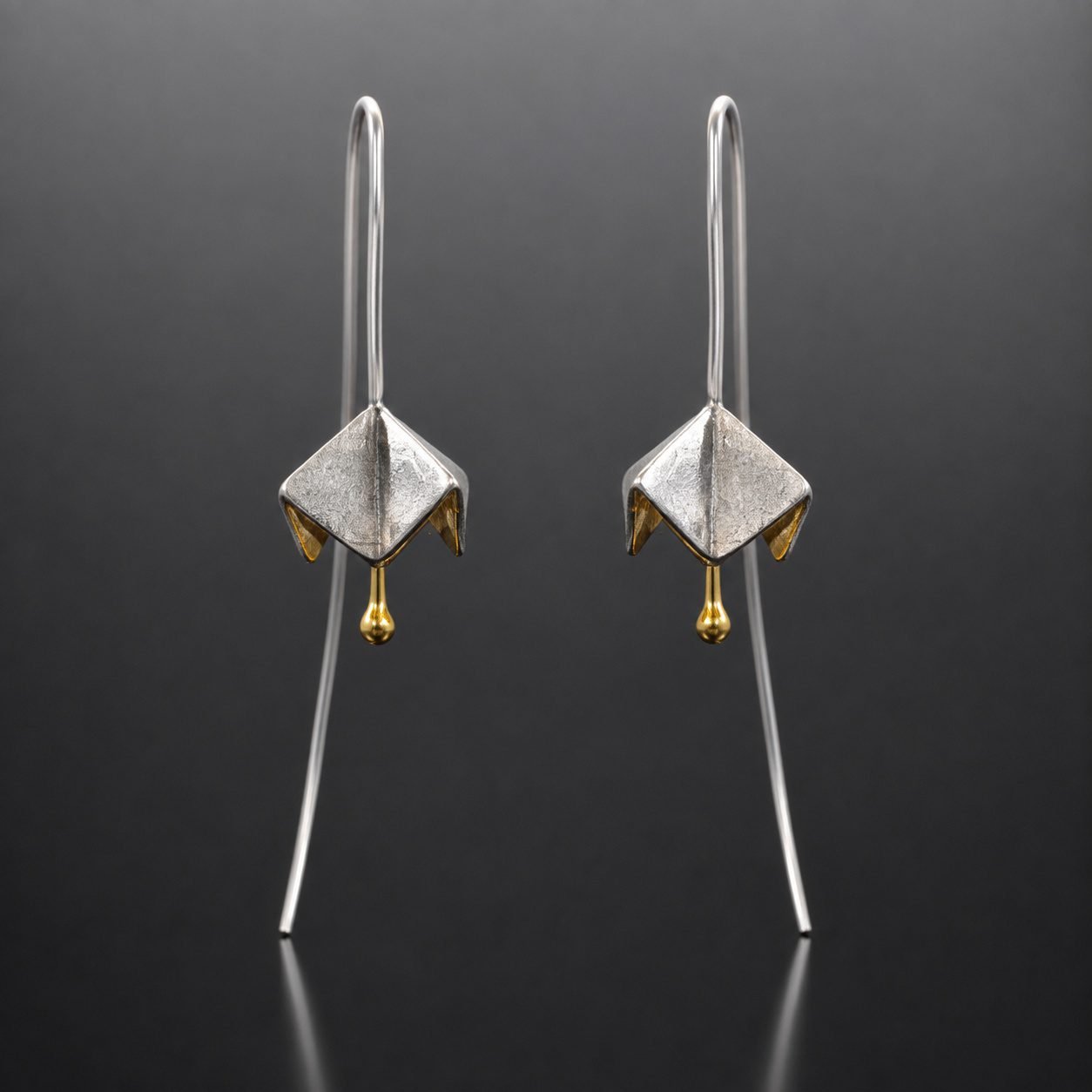 two tone black and gold statement earrings contemporary jewellery uk moon jewellery Origami earrings two tone gold plated oxidised silver Japanese flower design
