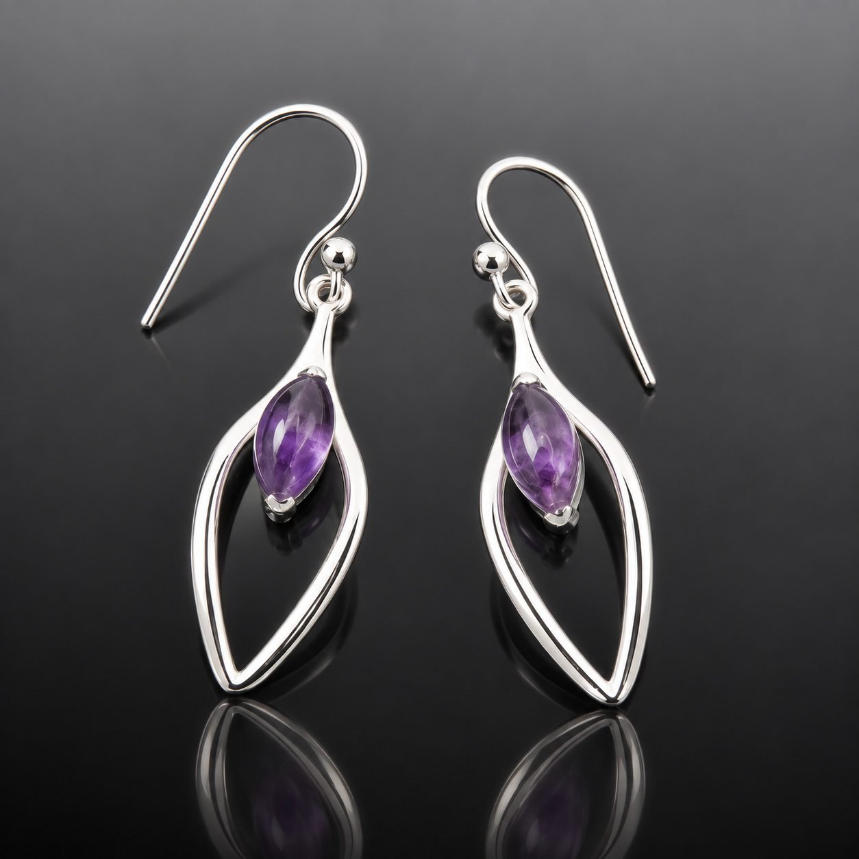 amethyst silver earrings handmade jewellery uk moon jewellery Amethyst drop earrings marquise amethyst cut out mirrored silver frame hook