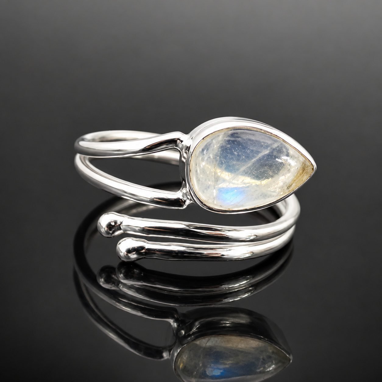 Adjustable moonstone ring wrap around mirrored sterling silver band handmade